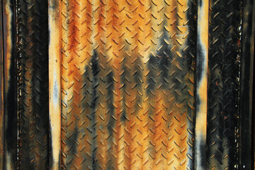 rustic metal plate with brown, black and yellow patina color and texture