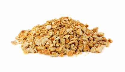 Fototapeta premium Pile of dried orange zest seasoning isolated on white