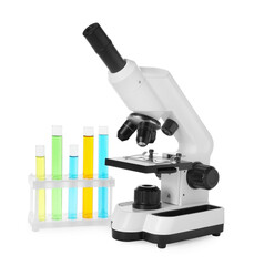 Test tubes with colorful liquids and microscope isolated on white