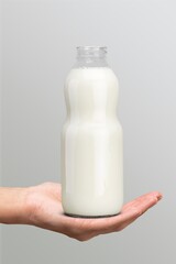 Hand holding Bottle of fresh milk