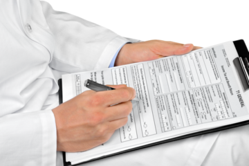Closeup of Doctor Filling Out a Medical Form