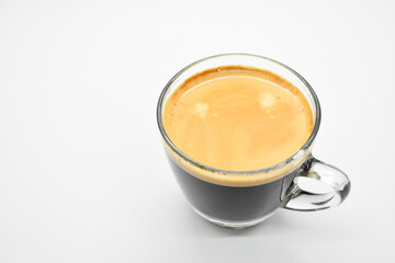 hot black coffee put on white table background