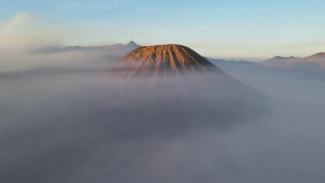 Mt. Bromo National Park in Java, Indonesia. Stunning drone footage. Perfect for travel, nature, and cultural projects, this footage showcases the rugged terrain, and mountainous landscape. 