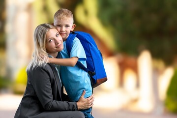 Young happy mother and child outdoors