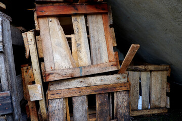 stacks of used wooden planks