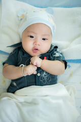 Cute newborn asian