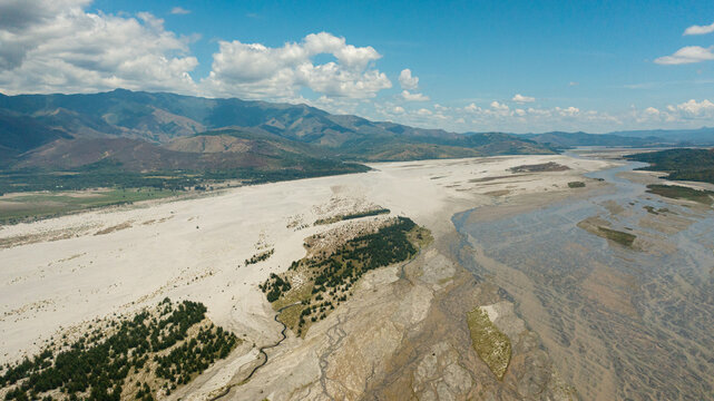 Top view of shallow river bed in a mountain valley. Bucao river. Luzon, Philippines.