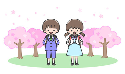 入学式　桜の前に立つ新一年生の男の子と女の子