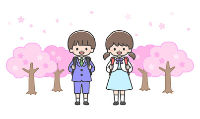 入学式　桜の前に立つ新一年生の男の子と女の子