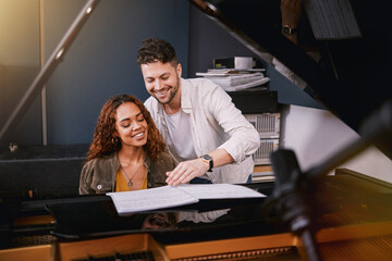 Musicians, piano and people writing music in a creative or recording studio with a song book. Art,...