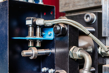 The working area of cnc multiform spring coiling machine close up.