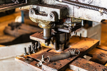 Automation hydraulic press stamping machine production line. industrial metalworking machines. Close-up of a hydraulic press in an industrial workshop at a factory.