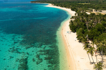 Aerial drone of Beautiful sea landscape beach with turquoise water. Pagudpud, Ilocos Norte, Philippines.