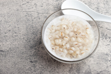 Job's tear in coconut milk in a glass cup