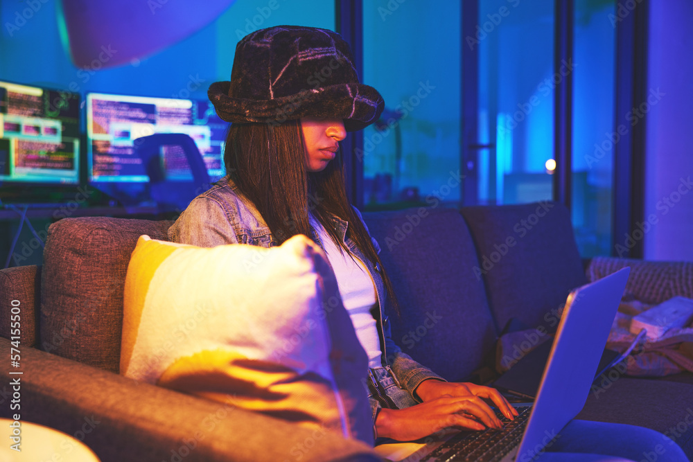 Leinwandbilder Woman, hacker and programmer typing on laptop in home at night in neon to hack software. Cybersecurity sofa, ransomware phishing and female coder coding on computer for hacking database with malware.