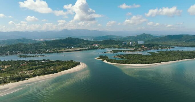 Aerial view of town Tuaran in a bay near the sea. Borneo, Malaysia.