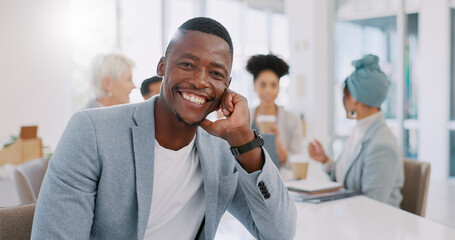 Meeting, office and face of a professional black man sitting at a table with a corporate team....