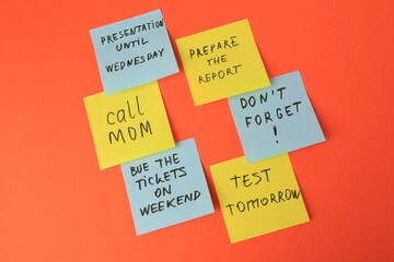 Many different reminder notes on orange background