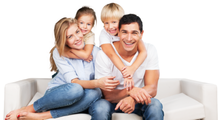 Beautiful smiling family sitting at sofa at home
