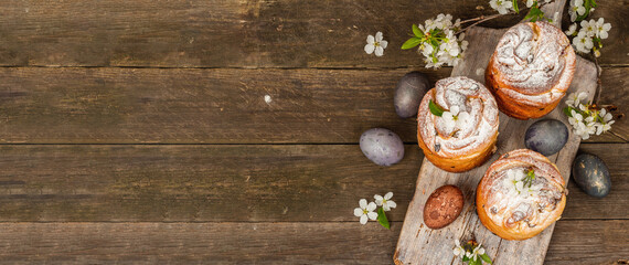 Easter cake Cruffin or sweet bread kulich with painted eggs. Traditional festive baking