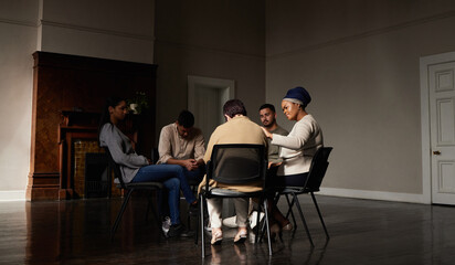 Support, group of people in therapy a community center and understanding, sharing feeling and...
