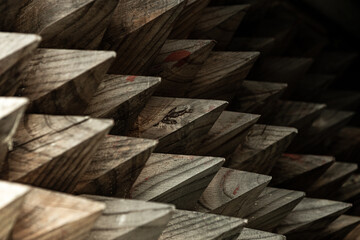 Pointy blocks of wood being piled up, Ant village, South Korea