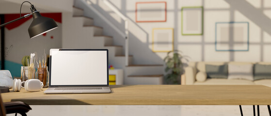 close-up, Workspace with laptop mockup, headphones, painting tools, table lamp and copy space