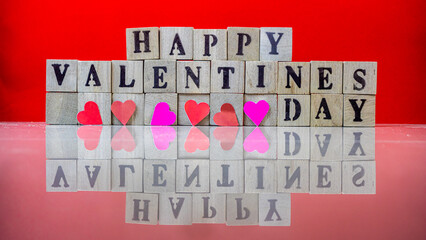 Happy valentine day on wooden blocks