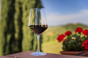 A glass of red Chianti wine at a vineyard in the famous Tuscany region of Italy