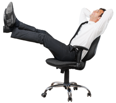 Smiling businessman sitting on chair and relaxing