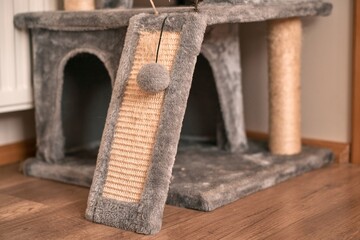house for cat with scratching posts and platforms. activity for indoor cats.