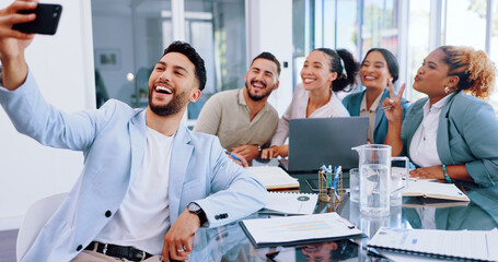 Fototapeta premium Business people, selfie and happy team in an office meeting with diversity, motivation and trust. Men and women group together for social media profile picture with peace emoji for collaboration