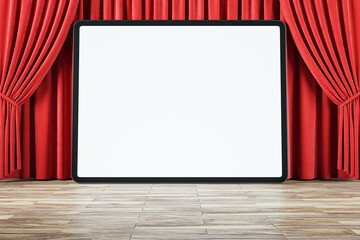 Front view on huge digital tablet blank white screen with space for your web design or landing web page on wooden floor and on red backstage curtain background, online movie. 3D rendering, mock up