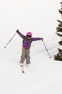 A girl backcountry skiing near Molas Pass above Silverton, Colorado.