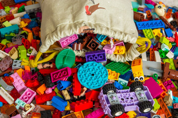 Fototapeta na wymiar Lot of colorful rainbow toy bricks background