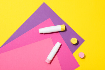 Concept of different office stationery with glue