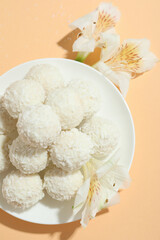 Concept of tasty sweets, coconut candies, top view