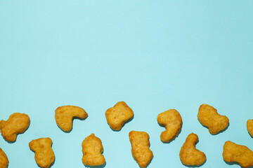Concept of tasty fast food, nuggets, space for text