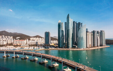 Fototapeta premium Skyscrapers of Busan on a sunny day. Aerial view