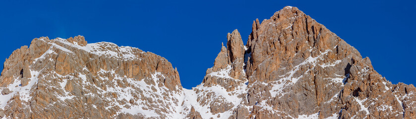 Veduta del gruppo della Marmolada da Passo san Pellegrino, (moena) nelle Dolomiti di Fassa.
Nella foto, a sinistra,  Punta del Ciadin (2809 m) e a destra, Cima Uomo (3010 m). - obrazy, fototapety, plakaty