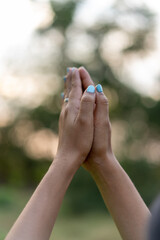 Asia woman Praying hands with faith in religion.