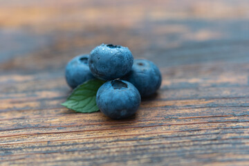 Blueberries on wooden table background