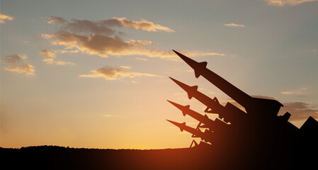 The missiles are aimed to the sky at sunset. Nuclear bomb, chemical weapons, missile defense, a...