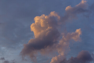 Beautiful golden hour sky. yellow sunlight clouds at sunset time.