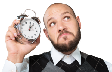 Young funny business man with retro clock