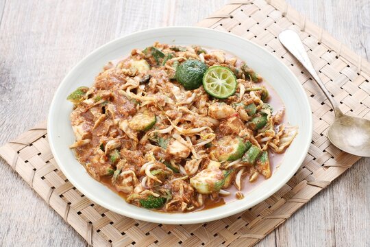 Karedok is a raw vegetable salad in peanut sauce from Sundanese region, West Java, Indonesia. It is one of the Sundanese signature dish.