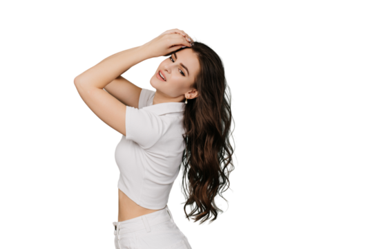 Gorgeous Hispanic brunette girl in white clothes with long wavy hair posing against transparent background. Beautiful sexy caucasian model . Mockup, healthy people, shopping, spa procedure, cosmetics.
