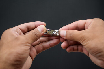 Cut fingernails isolated on black background. Clip fingernails or trim fingernails