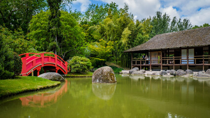 The Japanese garden of Toulouse, in Compans Caffarelli, with its lake, traditional building and red...