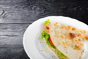 Tasty fresh sandwich with cheese and vegetables